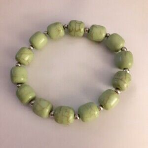 Pale green natural tones stretch bracelet casual beaded